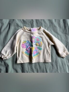 Little Me Cream Pullover with Colorful Rocking Horse Patch